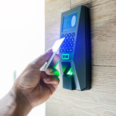 istockphoto-1151627487-612x612 Door access control. Staff holding a key card to lock and unlock door at home or condominium. using electronic card key for access. electronic key and finger scan access control system to unlock doors